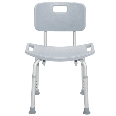 White adjustable shower chair with ergonomic backrest and rubber suction feet standing on a tiled shower floor.