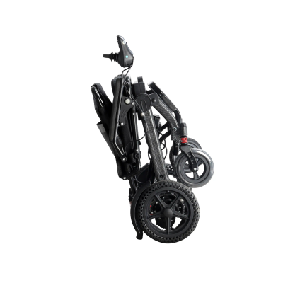 Folded electric wheelchair with black frame, compact wheel arrangement, and joystick controller positioned on the armrest.