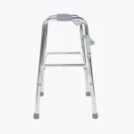 Oxidized aluminum folding walker with padded foam handles, two crossbars, and rubber-tipped adjustable legs.