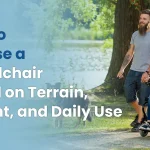 A person using a modern manual lightweight wheelchair on an outdoor park path, demonstrating ideal use for varied terrain and daily activity.